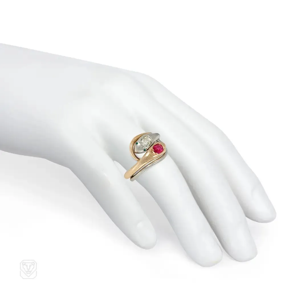 Antique gold and platinum double snake ring with ruby and diamond