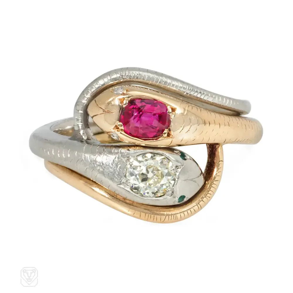 Antique gold and platinum double snake ring with ruby and diamond