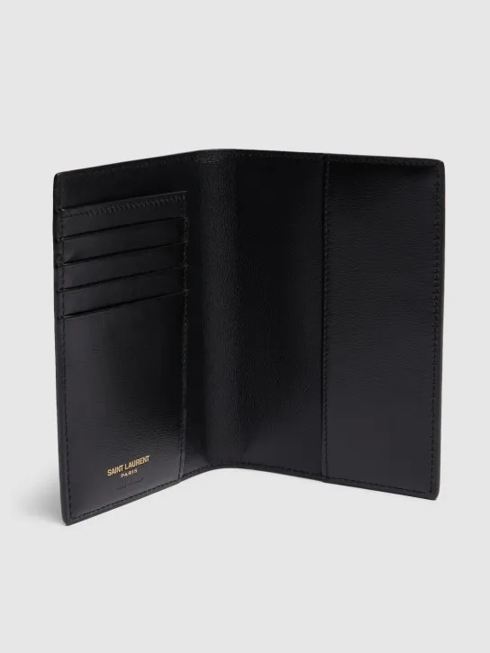 Saint Laurent   Tiny Cassandre leather passport case 