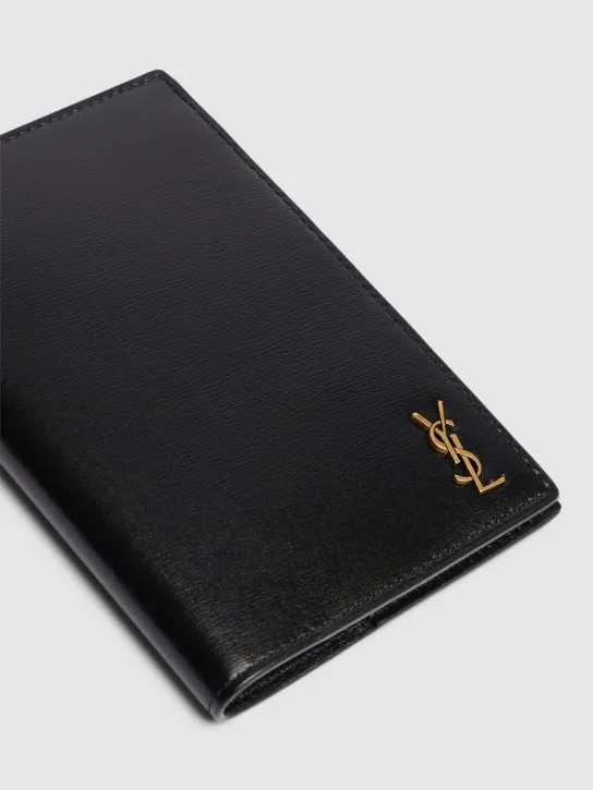 Saint Laurent   Tiny Cassandre leather passport case 